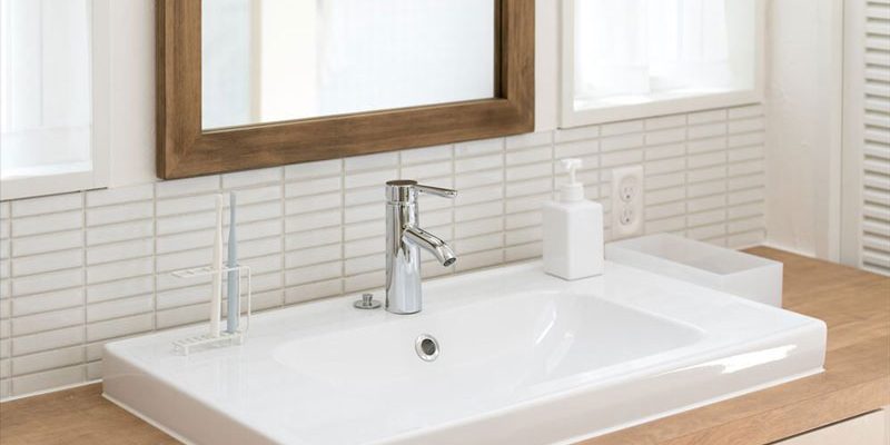 cambiar los grifos de cuarto de baño